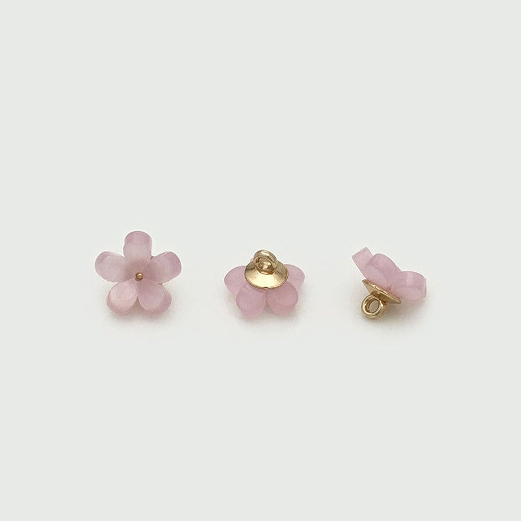 Lilac five petal bloom button from three angles