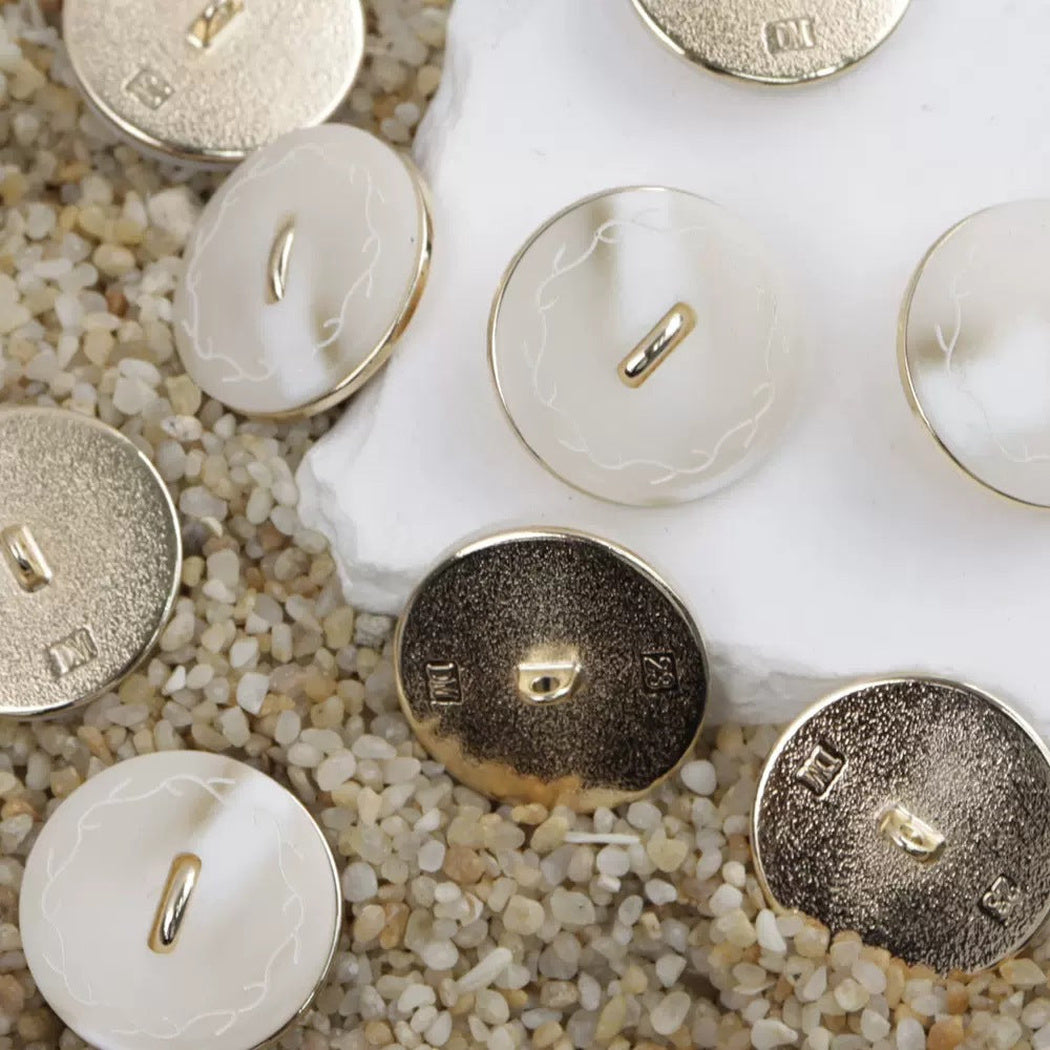 Beige coffee vine border shank buttons with front and reverse views