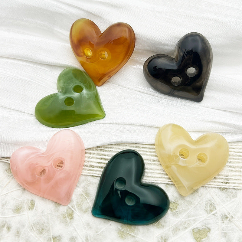 Heart-shaped buttons in six colors with two sewing holes